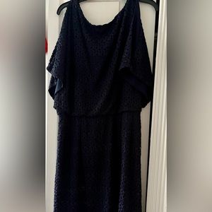 Navy lace dress with tie sleeves.